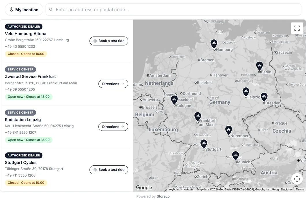 StoreLo as a dealer locator: authorized e-bike dealers and service centers across Germany, with bike pins, in the Slate Minimal template.